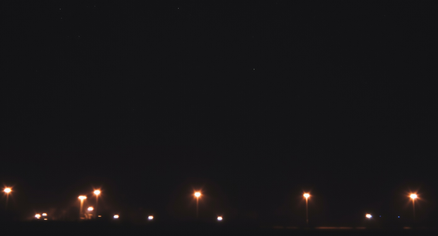 Chevron-shaped object with shimmering red and blue lights slowly descended over Simmern, Germany — Apr 22, 1993, 11:00 PM