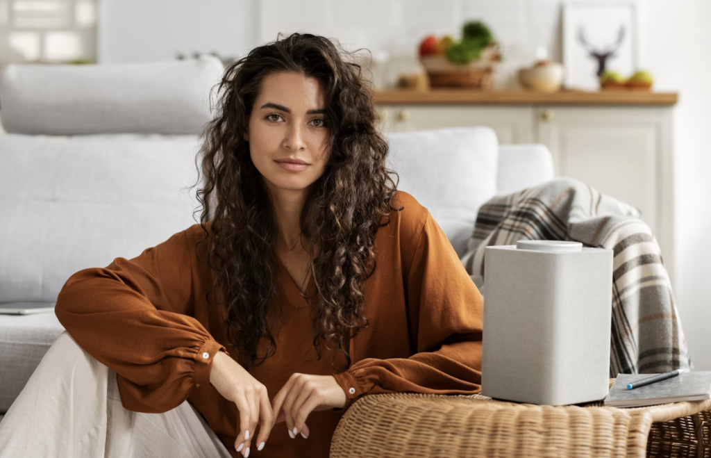 A woman with a smart speaker