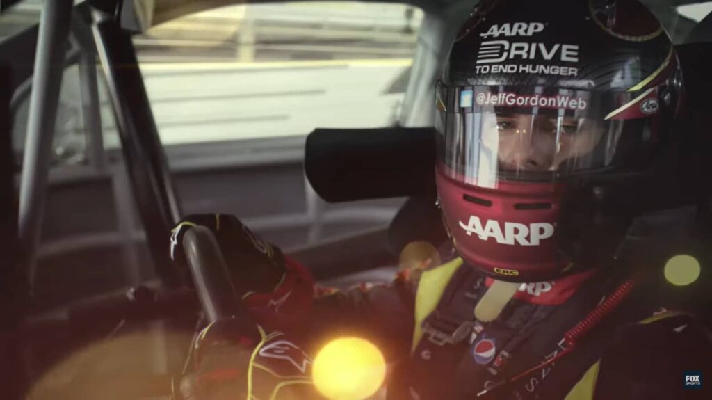 A focused race car driver ready at the starting line