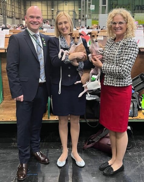 Crufts Judge Russell Hodges (left), Dini Westman & ‘Mojo’ (center), and Lynn Partridge & ‘Vibes’ (right)