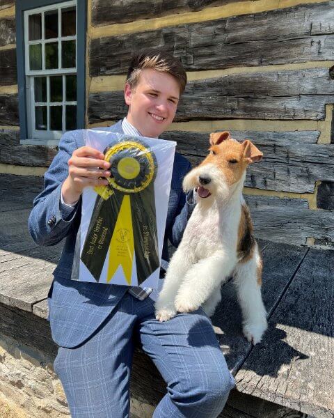 Luke Waters, the 2023 WKC Dog Show Best Junior Handler with Miniature Pinscher named "Kera."