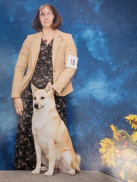 Faye Adcox with her Norwegian Buhund.