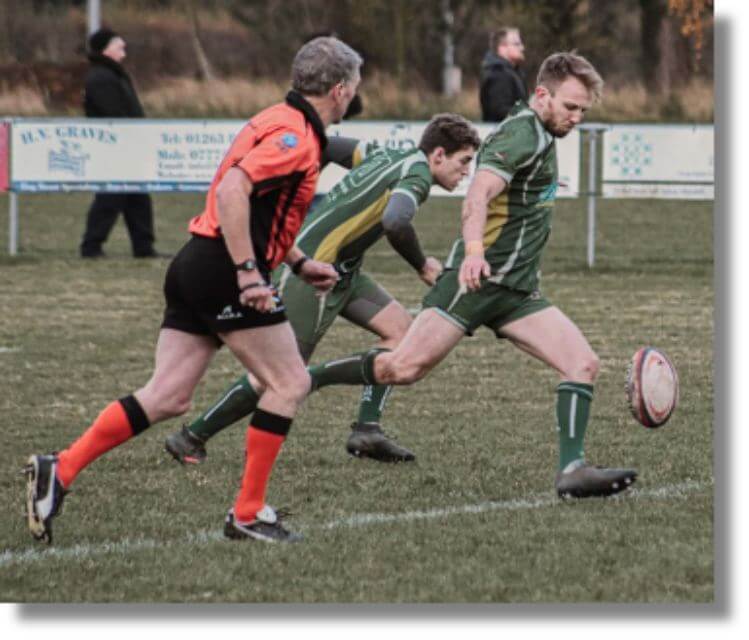 Men playing sports outside