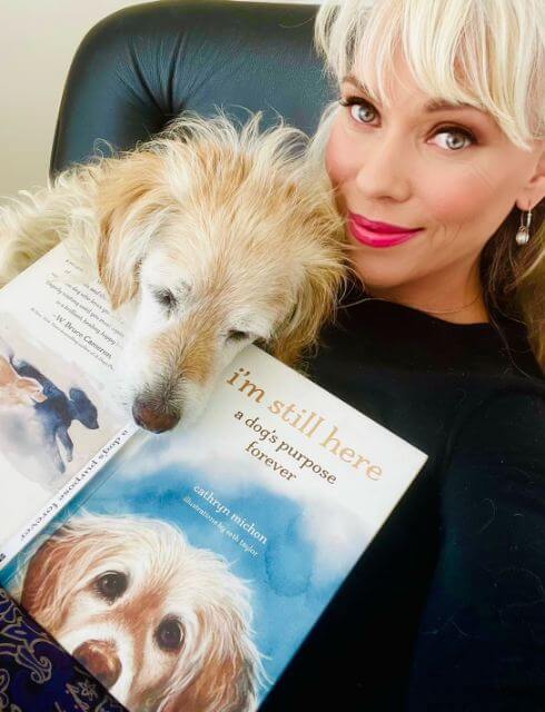 Cathryn Michon with Tucker and book