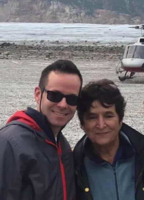 Joe and his Mom, Betteanne, visiting a glacier via helicopter in 2019