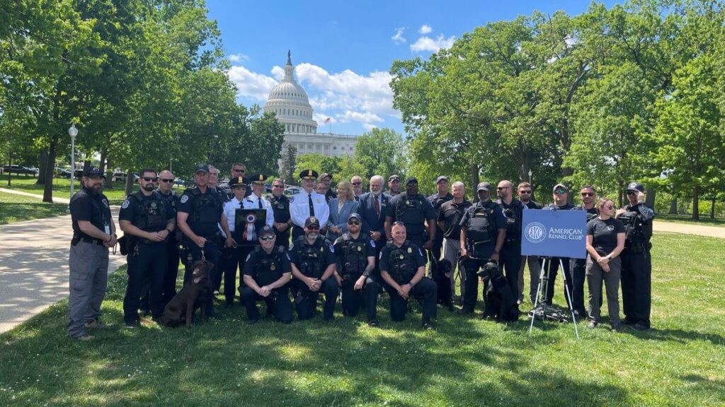 Hosted by members of our U.S. Congress, Sheila Goffe and Chris Sweetwood join U.S. Capitol police to celebrate AKC’s Anniversary.