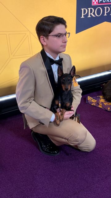 Hadrian and Simon right before his family left them to go on the floor.