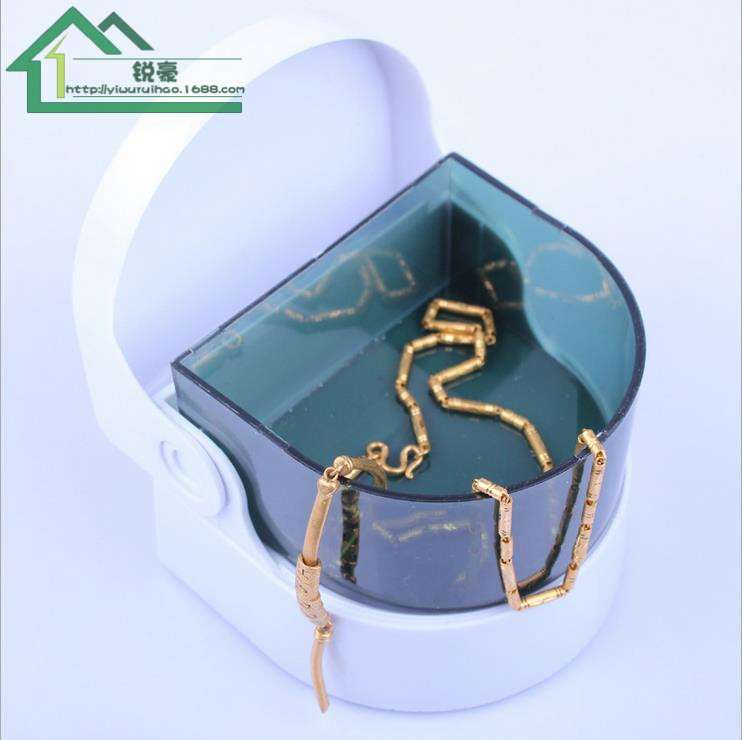 Mini electric jewelry cleaner