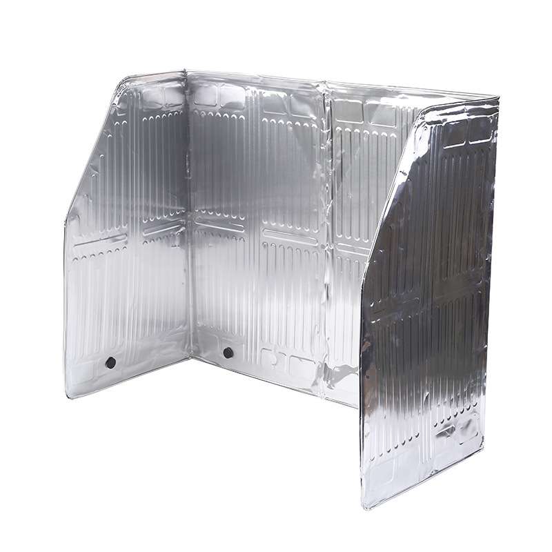 Aluminum Foil Oil Deflector on Kitchen Hearth for Cooking