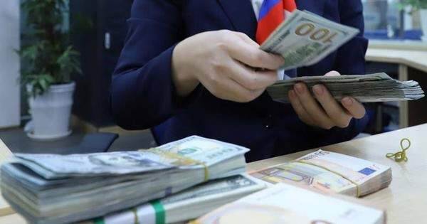 Áp lực vơi đi, VND chỉ mất giá khoảng 1,6%