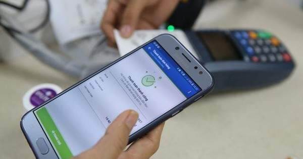 Tết năm nay, nhiều ngân hàng sẽ hết cảnh nghẽn giao dịch?