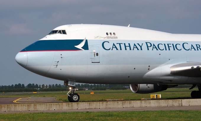 Cathay Pacific to halve profit payout to employees