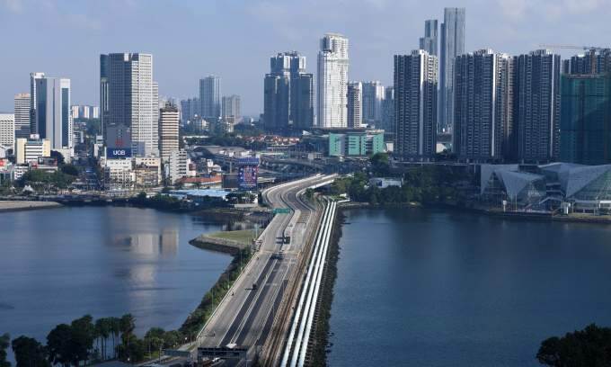Raising wages to 2/3 of Singapore's could draw Malaysians abroad back home