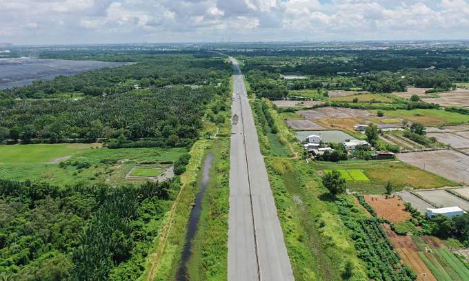 Wife pressures me to sell $83,000 land plot to build house, pay debt