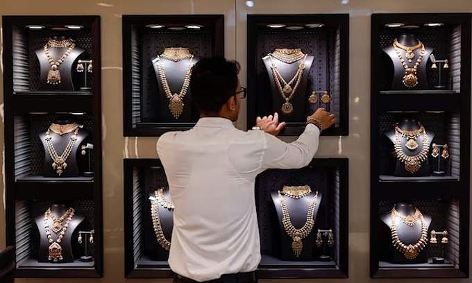 Customers in Asia race to cash in their old jewellery and coins