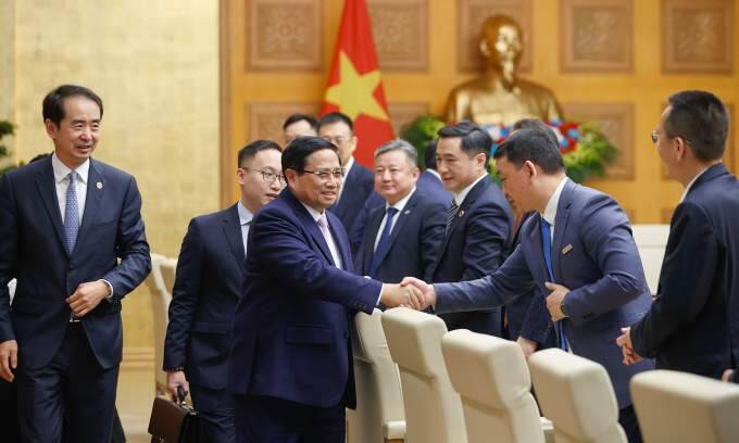 PM urges Vietnamese, Chinese firms to realize high-level agreements through concrete actions