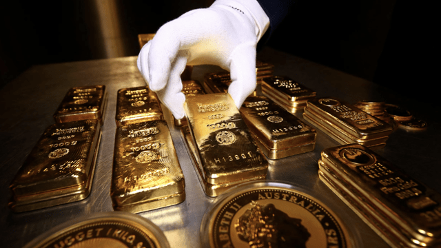 Giá vàng tăng vì đồng USD quay đầu giảm, SPDR Gold Trust bán ròng hơn 6 tấn vàng tuần này