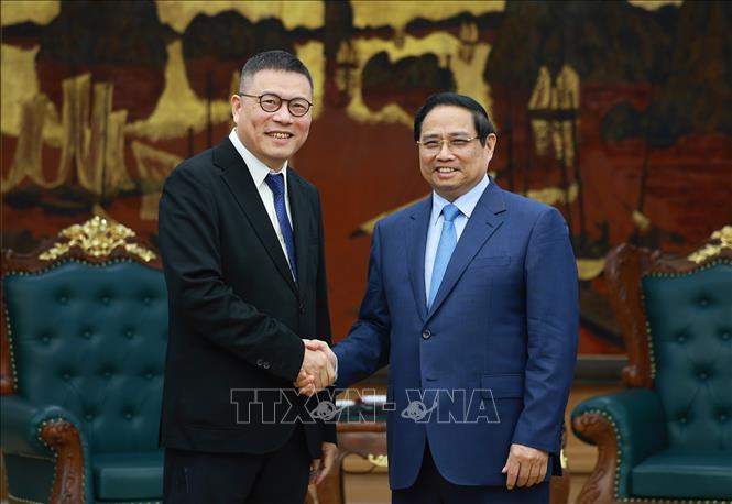 Thủ tướng Phạm Minh Chính tiếp ông Hồng Thiên Chúc, Chủ tịch Tập đoàn Texhong (Trung Quốc). Ảnh: TTXVN.