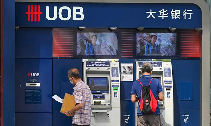 Singapore’s UOB to give 6,000 junior employees half-month salary payout