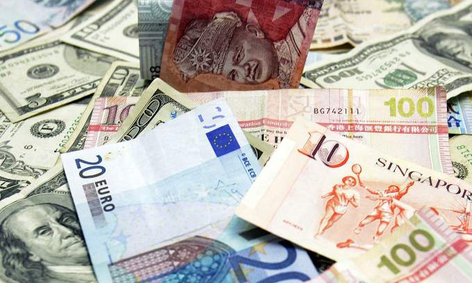 Southeast Asian currencies weaken as oil prices surge amid escalating Middle East tensions