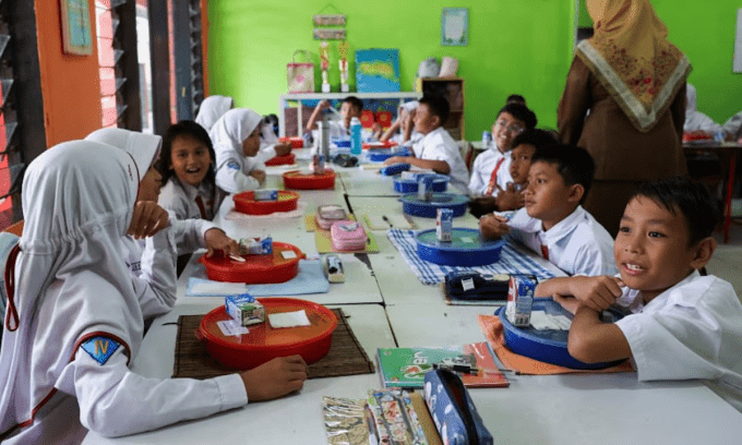 Indonesia cuts free meal budget as petrol prices soar