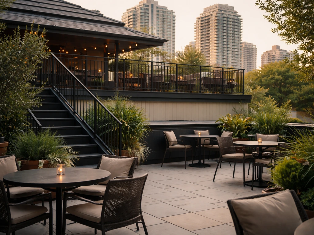 Toronto rooftop patio with layered levels and roofline view, outdoor seating under natural light.
