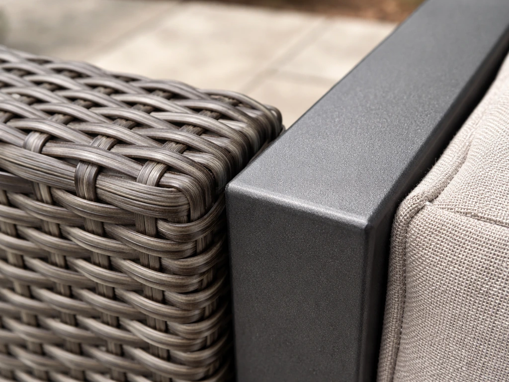 Close-up of synthetic resin wicker texture beside powder-coated steel frame finish