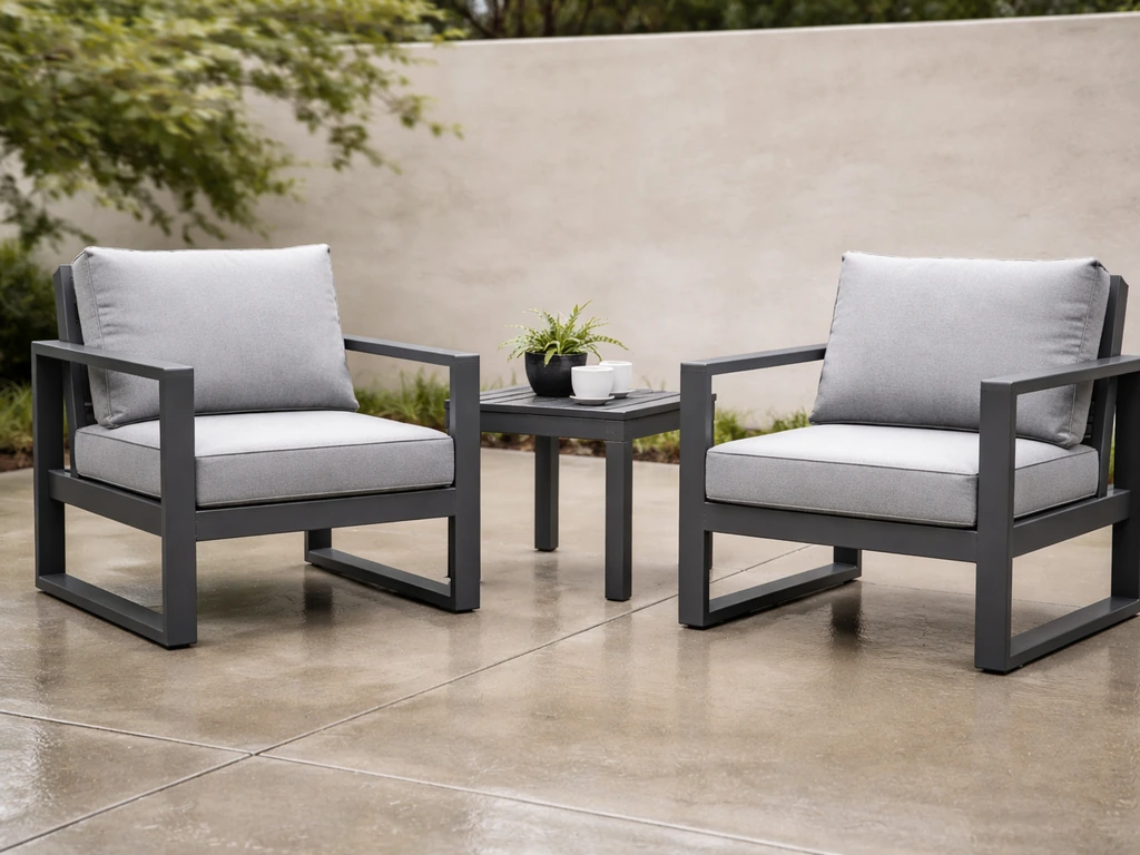 Powder-coated aluminum patio furniture outdoors with smooth painted frame and hardware details in natural light.