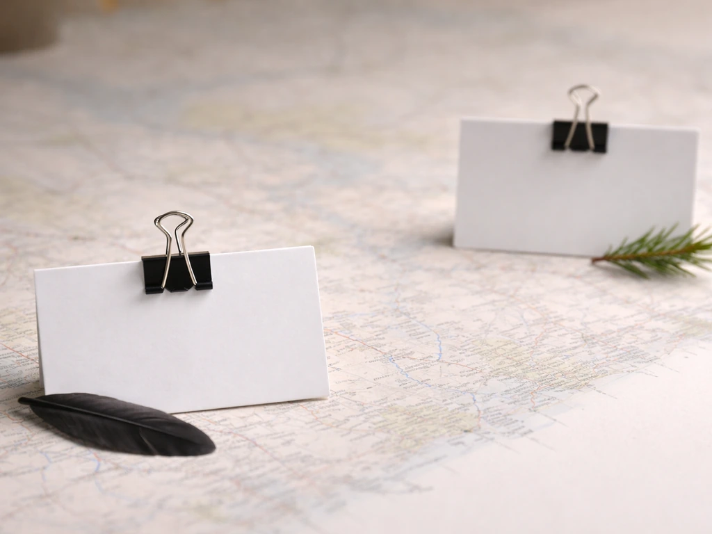 Minimal map-style background with two simple callouts comparing popular association and official designation.