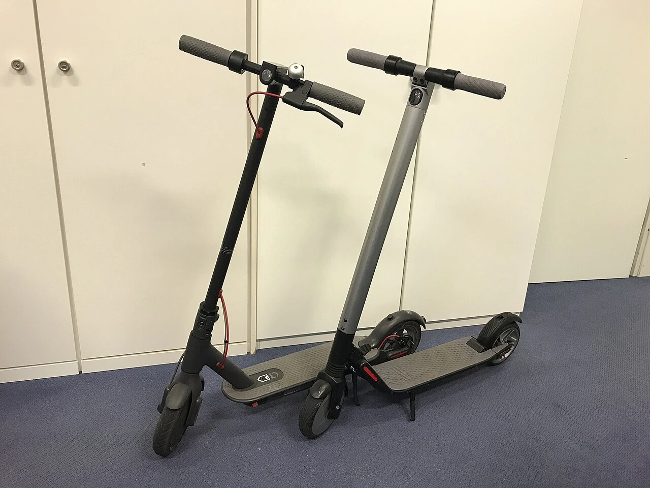 Bird electric scooters parked indoors