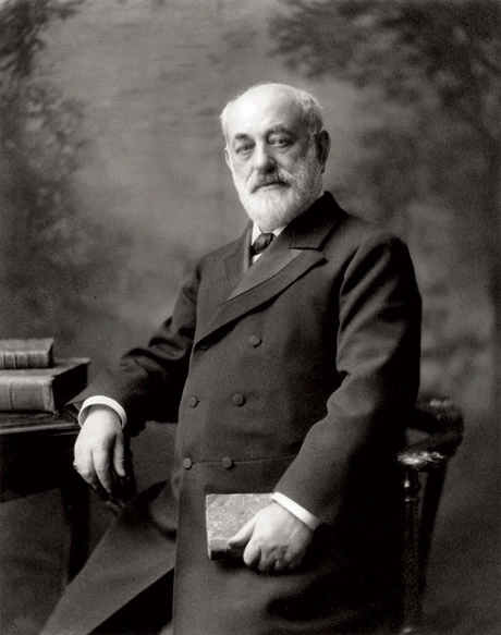 Black-and-white portrait of Marcus Goldman seated in formal attire