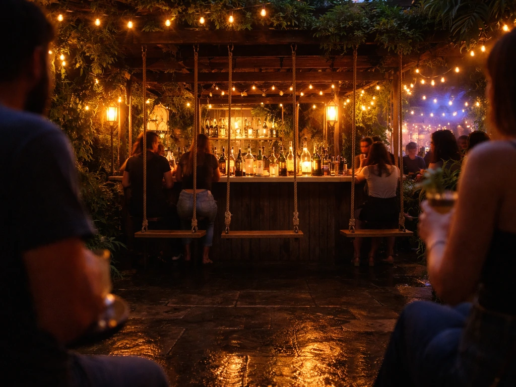 Warm-lit patio bar at dusk with glowing string lights, rope-swing seating, and a lively crowd vibe.