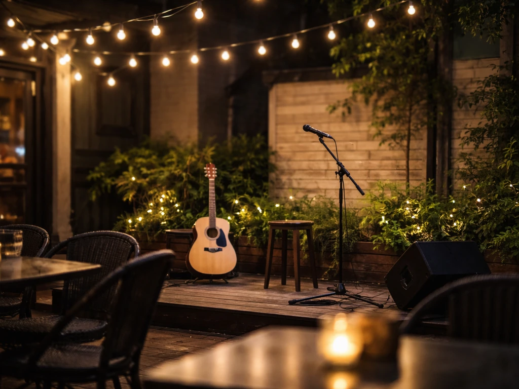 Night patio with a visible live-music setup, string lights, and quiet seating area.