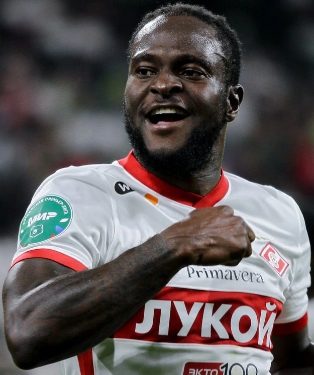 Victor Moses in a football kit, smiling during a match