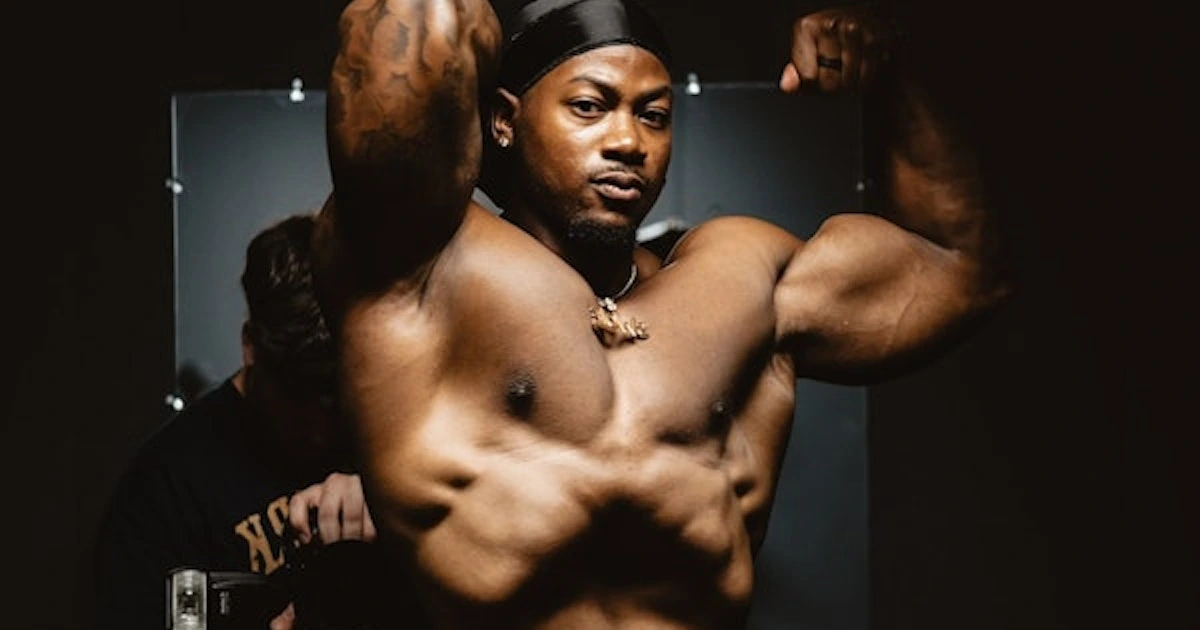 Christian Ricketts flexing in a gym setting
