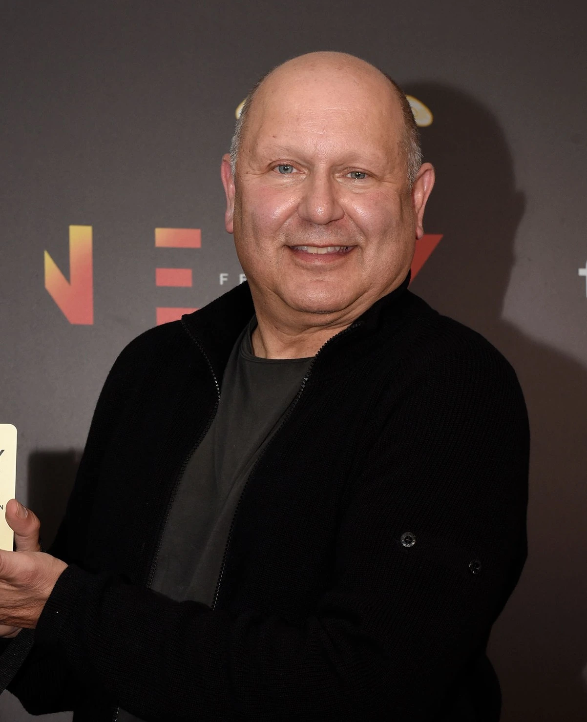 Chris Meledandri at a public event, smiling for the camera