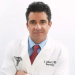 Portrait photo of Eric Ciliberti MD in a white coat