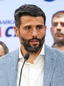 Aleksandar Šapić speaking at a podium during a public event