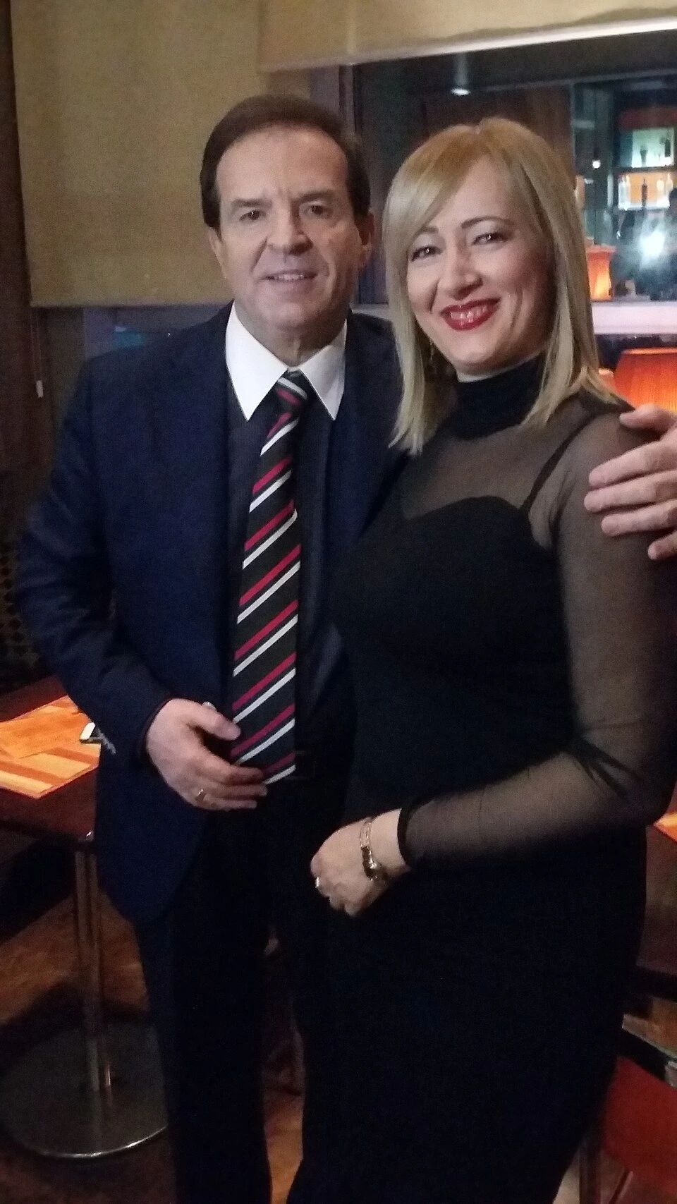 Bogoljub Karić posing with another person indoors