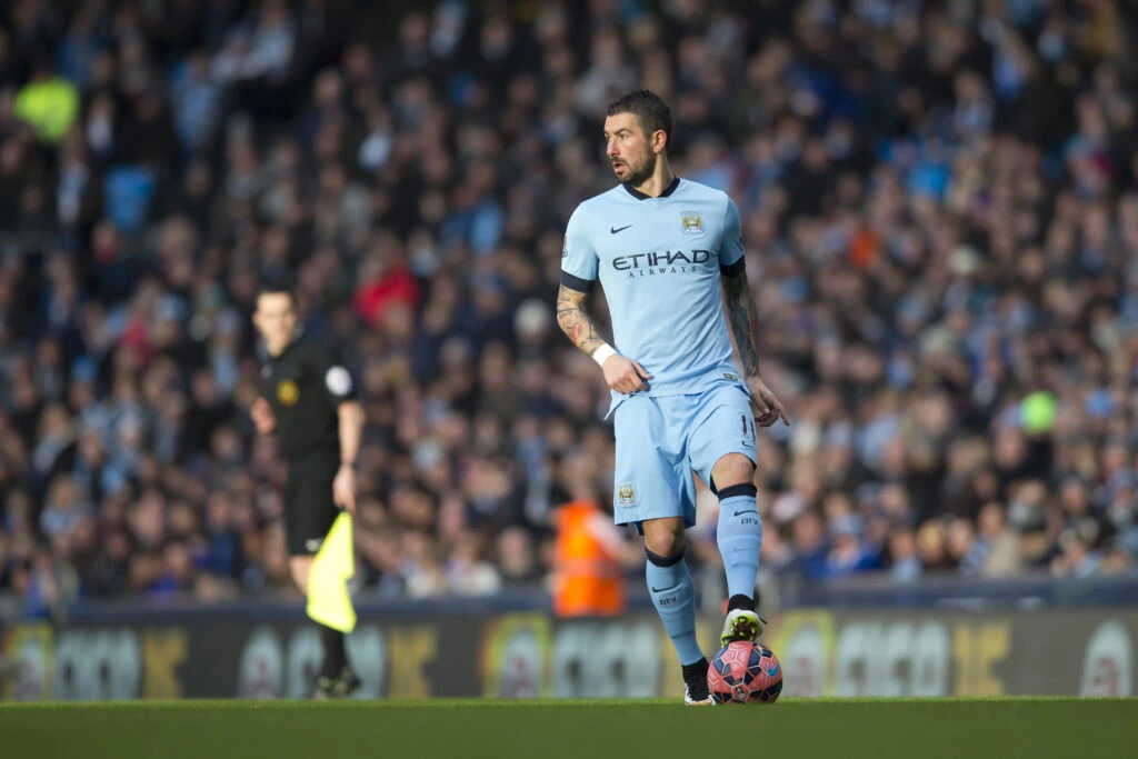 Aleksandar Kolarov in a Manchester City kit during a match