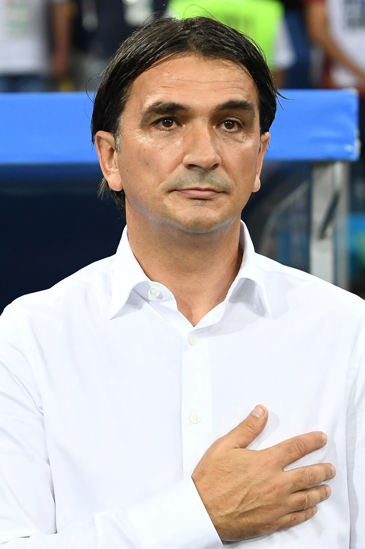 Zlatko Dalić in a white shirt at a football match