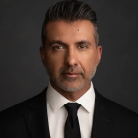 Portrait photo of Vick Tipnes, healthcare business executive and founder of Blackstone Medical Services