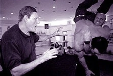 Killer Kowalski training John Quinlan in a wrestling ring