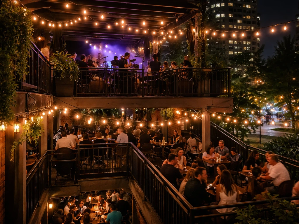 Multi-level Toronto patio at night with warm lights and live music energy
