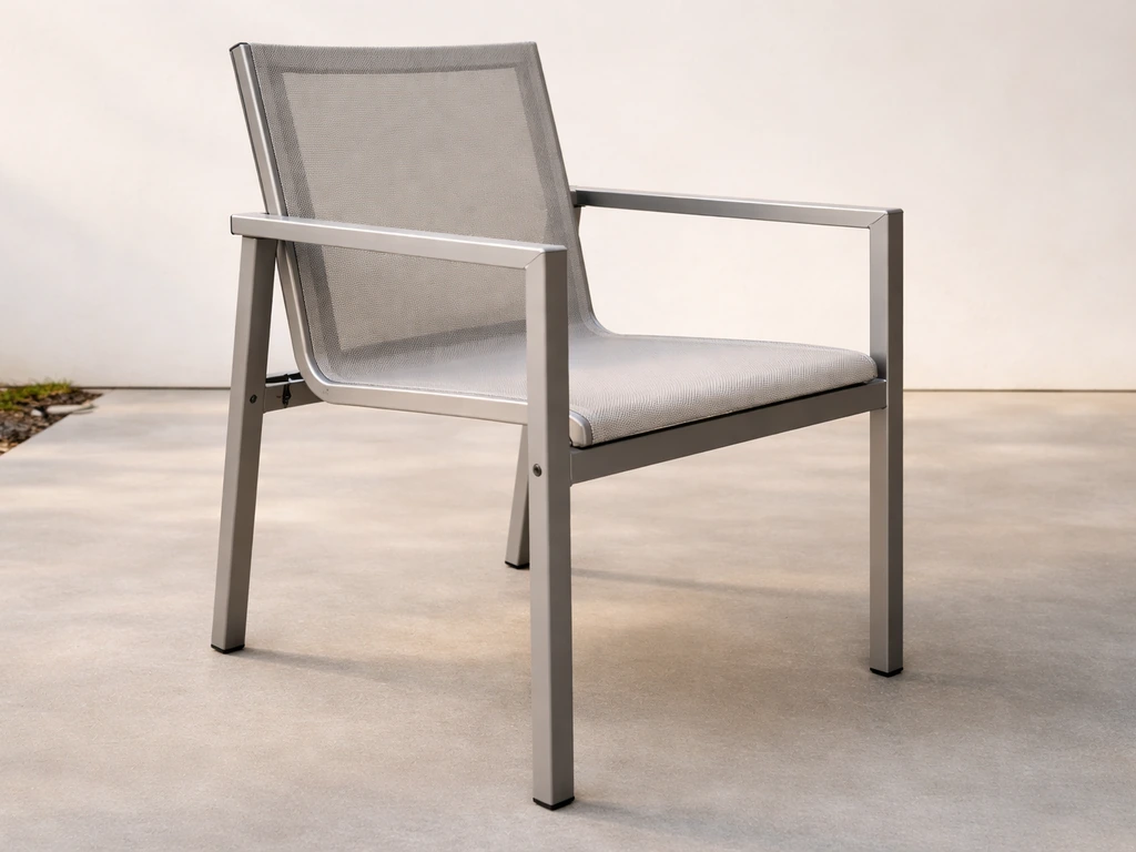 Single outdoor chair showing smooth welded aluminum joints and stable, non-wobbling frame.