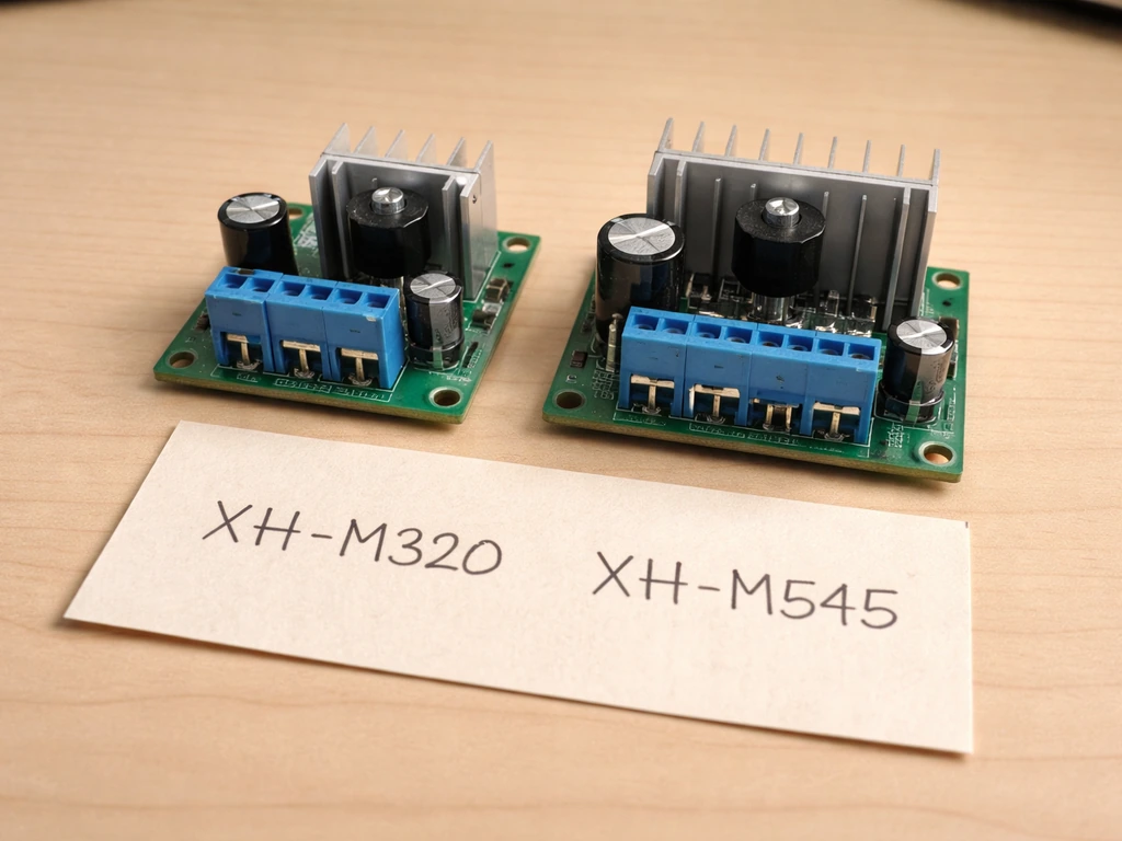 Close-up of two compatible electronic driver units side by side with visible model/part markings.