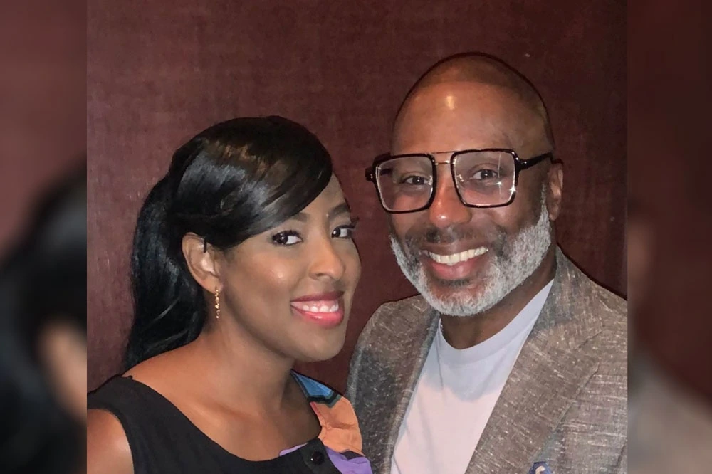Lateasha Lunceford smiling beside Gregory Lunceford in a candid photo.