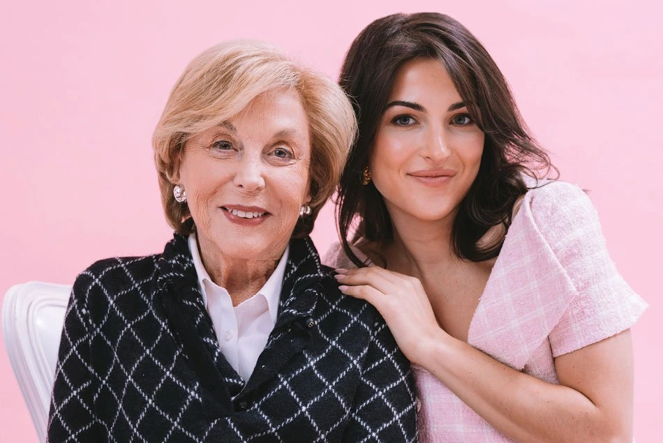 Kim Murstein with her grandmother Gail on a pink background for the Excuse My Grandma podcast