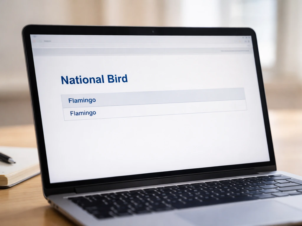 Screenshot-style photo of a laptop showing an official webpage entry listing a flamingo as national bird.
