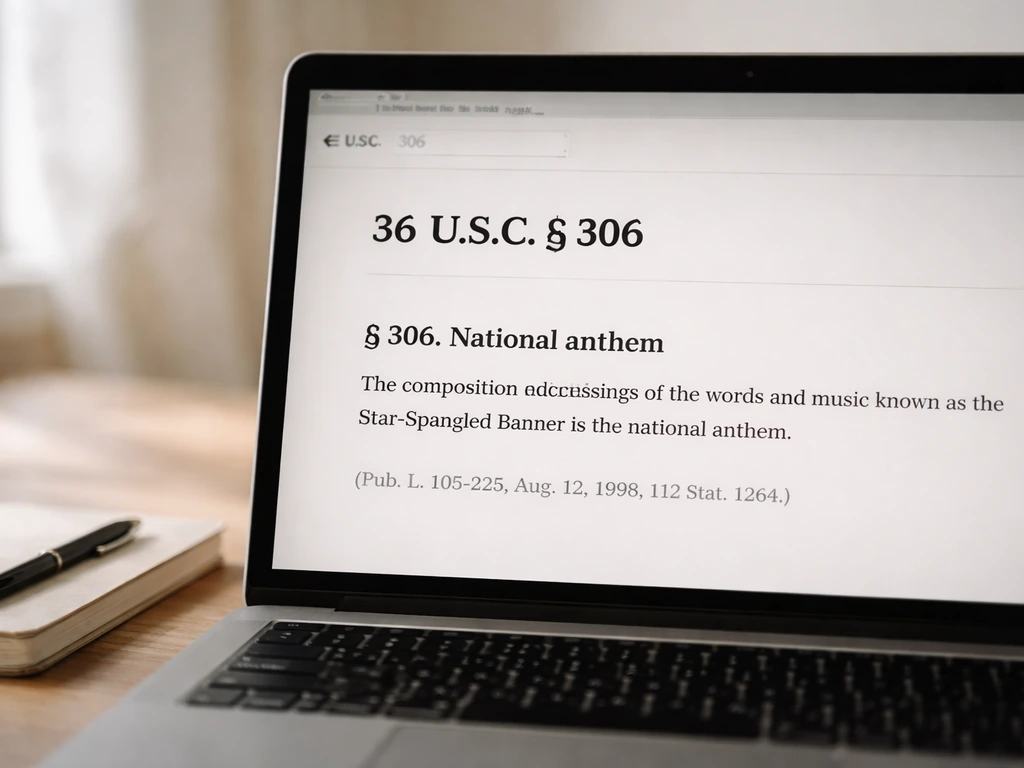 Close-up of a laptop screen displaying a legal information page about 36 U.S.C. § 306 for verification.